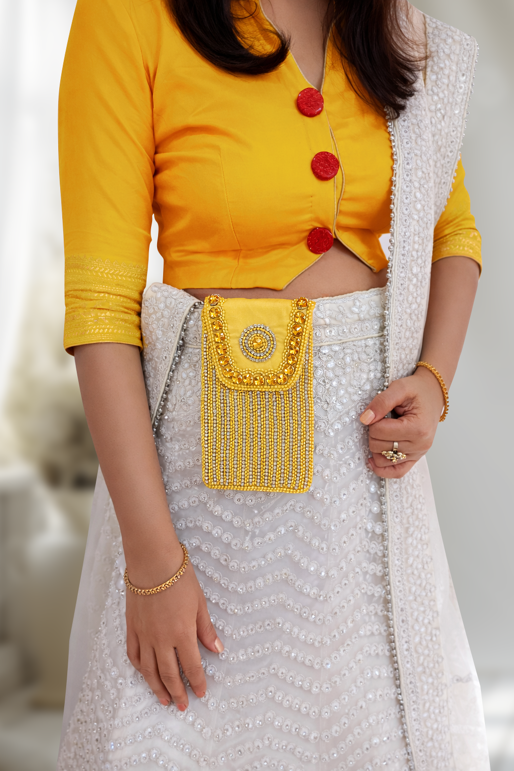 Aura Embellished Kaarnis Mobile Pouch Yellow